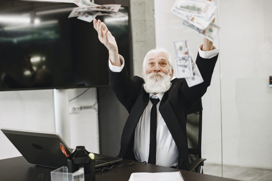 man celebrating profit in a recession